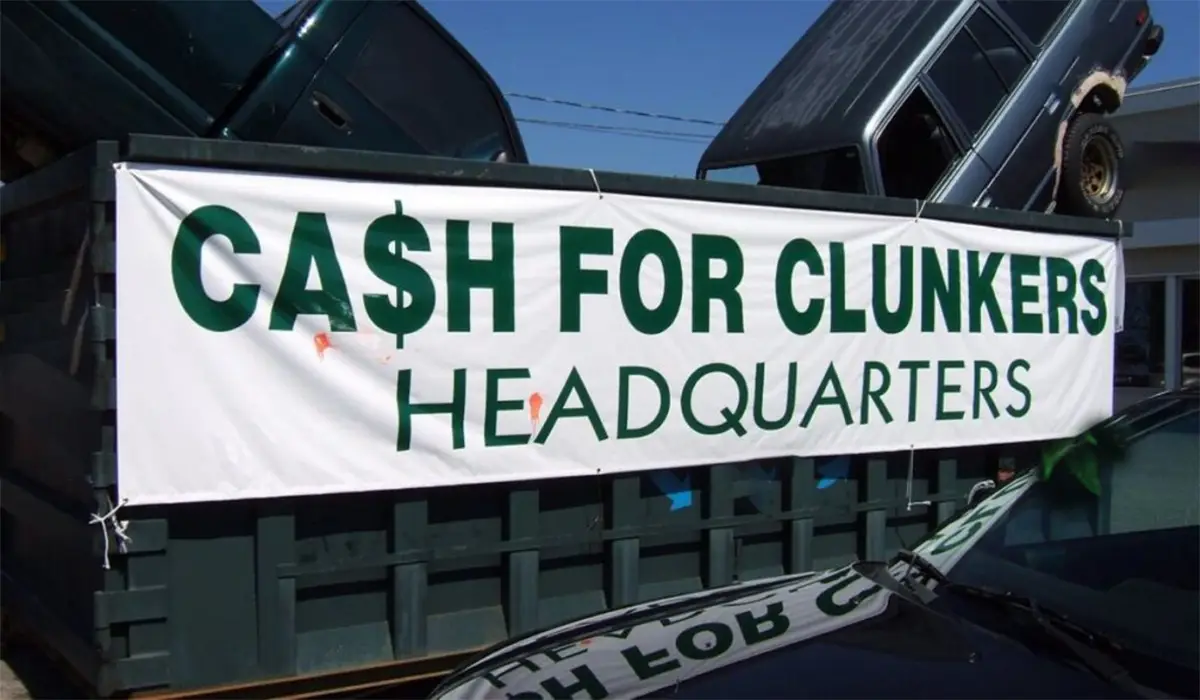 a banner that says cash for clunkers headquarters