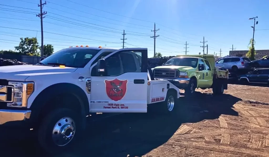 Tow trucks from A+ Junk N Tow transporting vehicles to sell a junk car safely in Illinois safely.