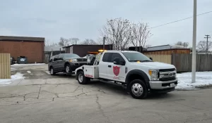 High-mileage SUV being towed, showing mileage matter less during junk car removal and valuation for sellers.