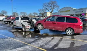 Car That Doesn’t Run getting removed from snowy suburban parking lot after winter mechanical vehicle failure.